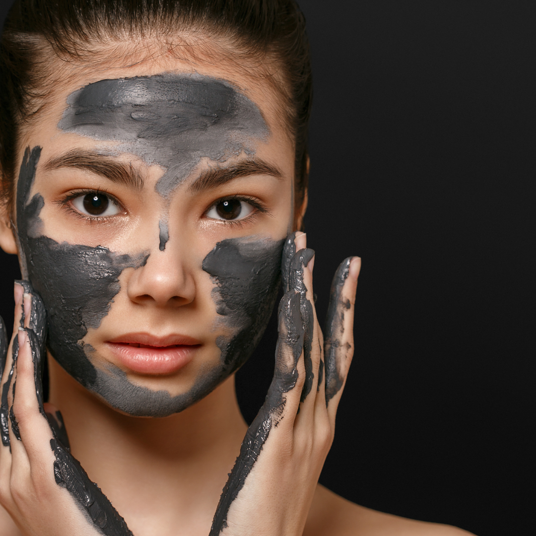 Woman wearing a grey natural mask for skin